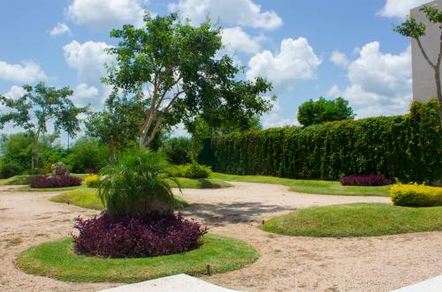 1151-32476-22ET-60-Venta-de-Terrenos-en-Privada-Yaxlum-en-Conkal-Yucatan-listos-para-construir-_(3).jpg