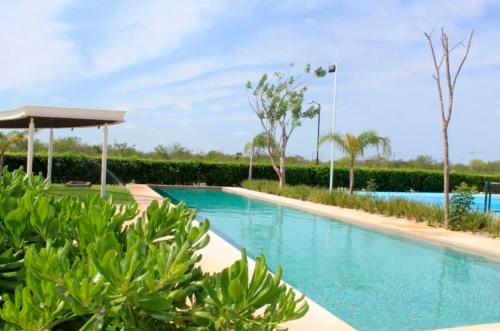 1151-32491-22ET-60-Venta-de-Terrenos-en-Privada-Yaxlum-en-Conkal-Yucatan-listos-para-construir-_(18).jpg