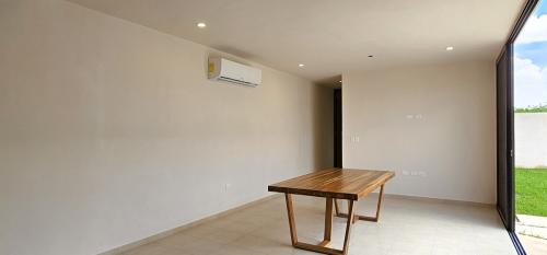1252-44909-Casa-en-venta-en-Cholul-Merida-con-recamara-en-planta_baja-y-alberca_(13).jpg