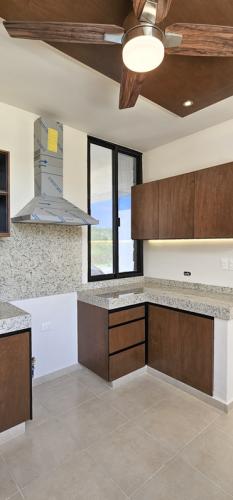 1252-44945-Casa-en-venta-en-Cholul-Merida-con-recamara-en-planta_baja-y-alberca-v_(16).jpg