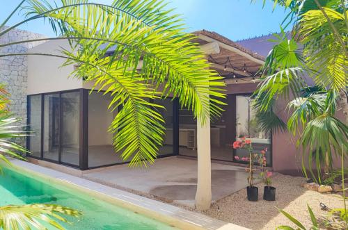 1457-43645-Casas-tiki-tiki-en-venta-de-una-planta-en-Cholul-norte-de-Merida-3-habitaciones.jpg