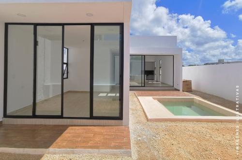 1656-46017-Casa-en-venta-en-Cholul-Merida-Fiora-de-1-piso-en-privada-residencial_(10).jpg