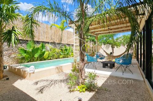 1700-50620-Casa-Tiki-Tiki-en-venta-de-una-planta-en-Cholul-Merida-modelo-B-con-alberca_(22).jpg