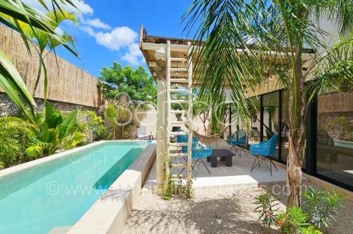 1700-50621-Casa-Tiki-Tiki-en-venta-de-una-planta-en-Cholul-Merida-modelo-B-con-alberca_(23).jpg
