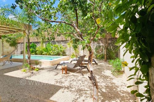 1700-50624-Casa-Tiki-Tiki-en-venta-de-una-planta-en-Cholul-Merida-modelo-B-con-alberca_(27).jpg