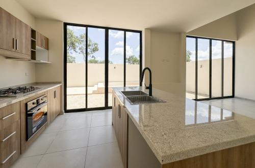 1732-50772-Casa-en-venta-en-Naia-Residencial-Conkal-con-recamara-en-planta-baja-Ikkil-Plus_(47).jpg