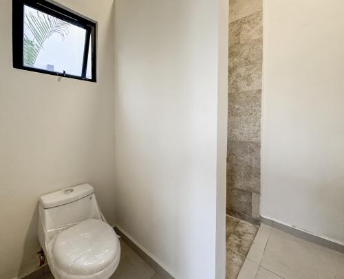 1806-52772-Casa-en-venta-de-un-piso-con-2-habitaciones-y-alberca-en-Naia-Residencial-Conkal_(28).jpg