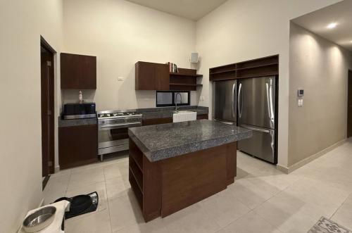 1818-50042-_Casa-en-venta-en-Merida-Cholul-de-2-recamaras-con-alberca_(10).jpg