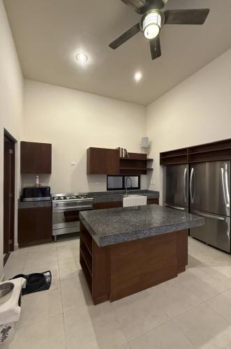 1818-50043-_Casa-en-venta-en-Merida-Cholul-de-2-recamaras-con-alberca_(11).jpg