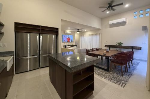 1818-50045-_Casa-en-venta-en-Merida-Cholul-de-2-recamaras-con-alberca_(12).jpg