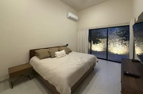 1818-50063-_Casa-en-venta-en-Merida-Cholul-de-2-recamaras-con-alberca_(31).jpg