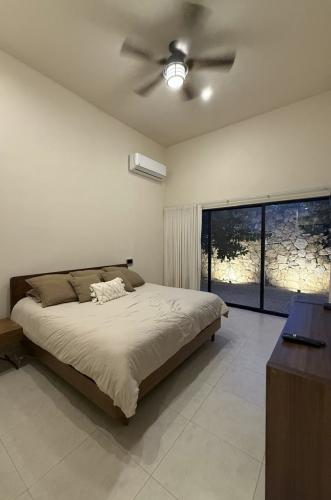 1818-50064-_Casa-en-venta-en-Merida-Cholul-de-2-recamaras-con-alberca_(32).jpg
