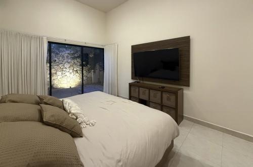1818-50065-_Casa-en-venta-en-Merida-Cholul-de-2-recamaras-con-alberca_(33).jpg