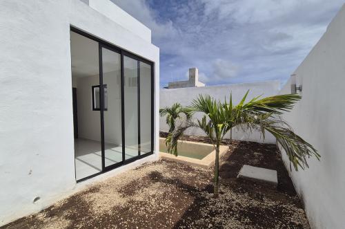 1834-50834-Casa-en-Venta-en-Gran-San-Pedro-Cholul-coN-habitación-en-planta-baja-y-alberca_(12).jpg