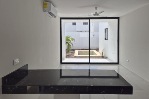 1834-50838-Casa-en-Venta-en-Gran-San-Pedro-Cholul-coN-habitación-en-planta-baja-y-alberca_(16).jpg