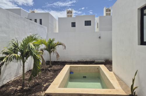 1834-50842-Casa-en-Venta-en-Gran-San-Pedro-Cholul-coN-habitación-en-planta-baja-y-alberca_(20).jpg