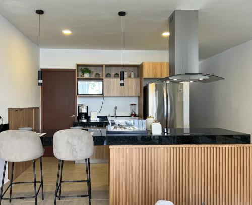 1934-52823-Casa-en-venta-en-privada-Macora-86-Cholul-con-dos-recamaras-family-room_(10).jpg