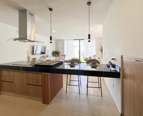 1934-52826-Casa-en-venta-en-privada-Macora-86-Cholul-con-dos-recamaras-family-room_(13).jpg