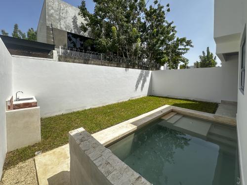 2013-54467-Casa-en-venta-en-privada-Nuukul-Temozon-Norte-con-electrodomesticos-incluidos_(35).jpg