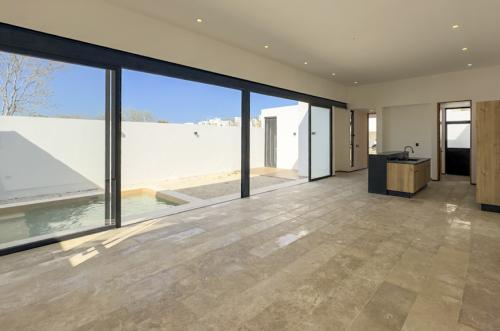 2027-55092-Casa-en-venta-en-Conkal-Merida-de-una-planta-con-3-habitaciones-y-alberca_(7).jpg