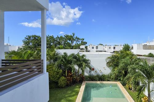 2028-54869-Casa-en-Venta-Dzityá-Mérida-con-super-Cocina-Jardín-y-Alberca_(44).jpg