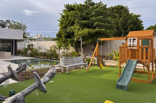 2029-54820-Casa_estilo-Townhouse-en-venta-en-cholul-al-norte-de-Merida-THULA-CITY-HOME__(39).jpg