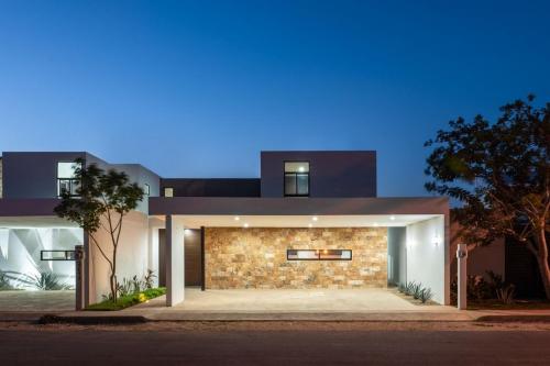 654-23642-20WE-24_casas_con_doble_altura_con_alberca_en_privada_en_temozón_merida-02.jpg