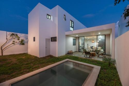 654-23658-20WE-24_casas_con_doble_altura_con_alberca_en_privada_en_temozón_merida-19.jpg