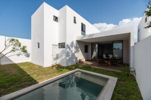 654-23659-20WE-24_casas_con_doble_altura_con_alberca_en_privada_en_temozón_merida-20.jpg